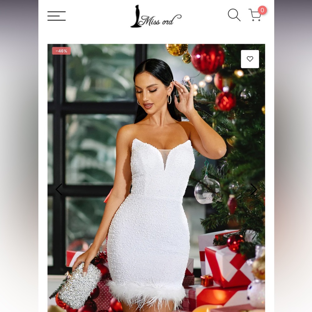 Strappless Sequin Mini Dress with feather detail.